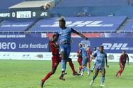 Peter Hartley and Stephen Eze headed away most of NorthEast United FC's long-balls. Courtesy: ISL